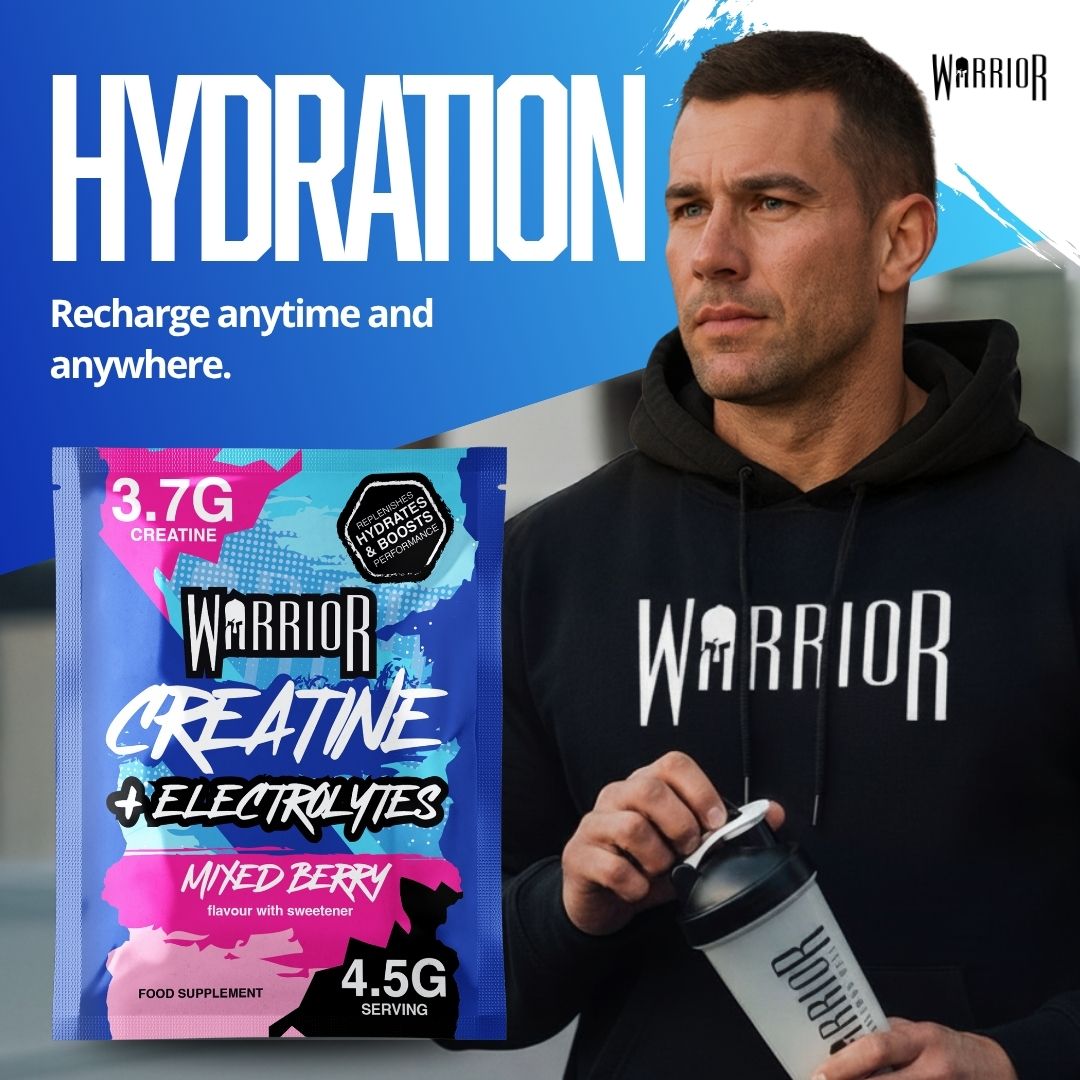 Athlete wearing a Warrior hoodie holding a shaker next to Warrior Creatine + Electrolytes sachet. The image promotes hydration, performance, and recovery anytime, anywhere.