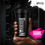 Warrior Home of Creatine Shaker 600ml in black held in hand next to a height guide showing 23cm and a 12.5cm base diameter, with 600ml capacity callout