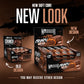 Warrior Crunch Fudge Brownie protein bar retail display graphic comparing the old design box and the new 'Soft Core' design box, with the text 'You may receive either design'.