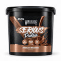 A 4.5kg tub of Warrior Serious Protein Chocolate Milkshake, featuring a black tub with a metallic brown and black label, set against a plain white background.