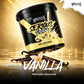 A black tub of Warrior Serious Protein Vanilla Milkshake powder is shown floating above vanilla beans and a white flower on a reflective gold background. The label is black and gold with white text, and the Warrior brand logo appears in the top right corner.
