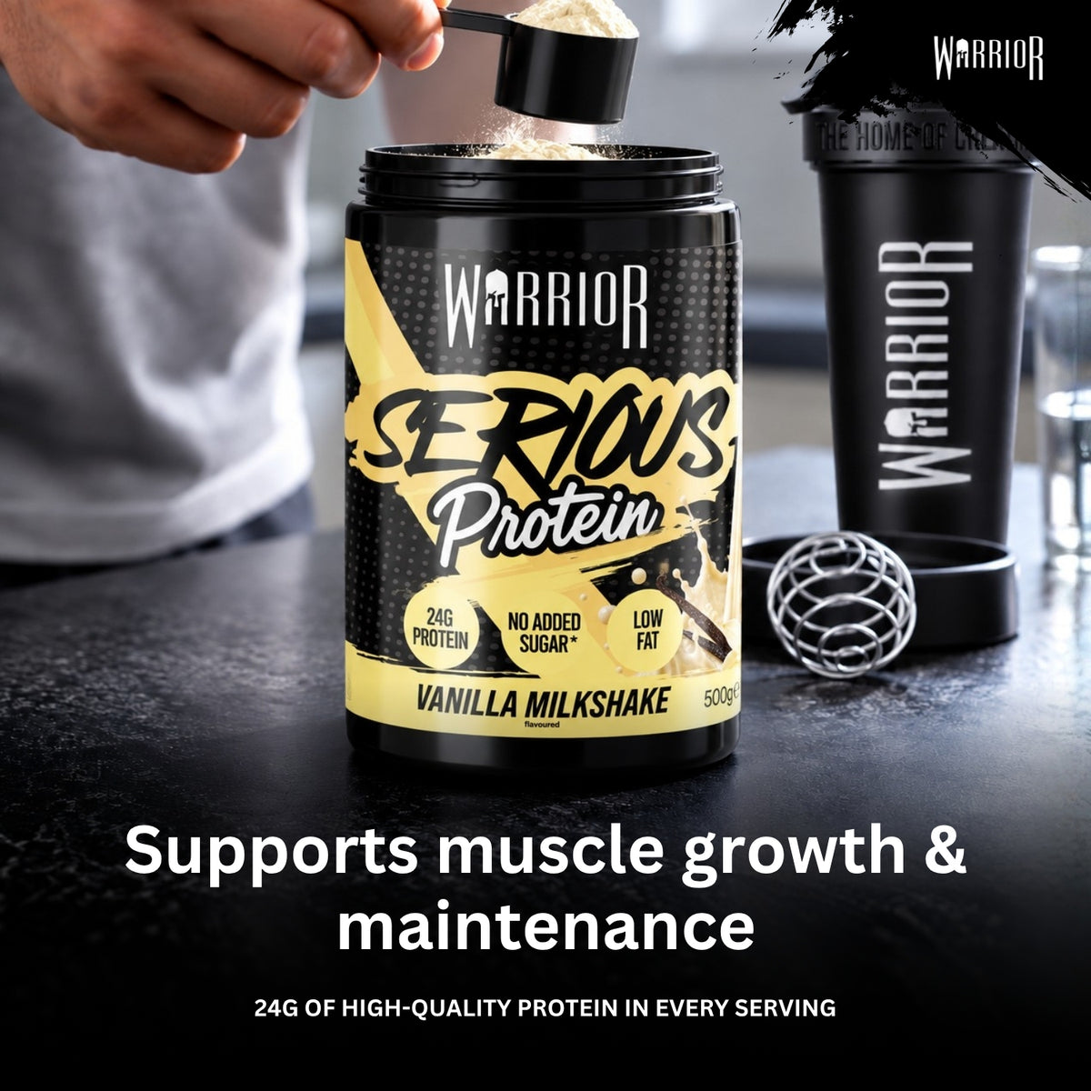 A person's hand is shown adding a scoop of powder into a black tub of Warrior Serious Protein Vanilla Milkshake. A matching black Warrior shaker bottle and a metal mixing ball sit on a dark countertop, with text below reading 'Supports muscle growth & maintenance' and '24g of high-quality protein in every serving'.