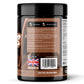 Back label of Warrior Serious Protein tub, Chocolate Milkshake flavour, brown label, showing serving suggestion instructions ("add one scoop to 250-300ml cold milk or water"), usage warnings, storage information, and UK/EU manufacturer addresses (KBF Enterprises, Manchester; Freyr, Germany).