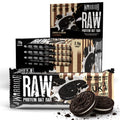 Warrior RAW Protein Bar 24-pack Cookies & Cream box, sleeve of bars and single wrapper with Oreo cookies and milk splash, group product shot