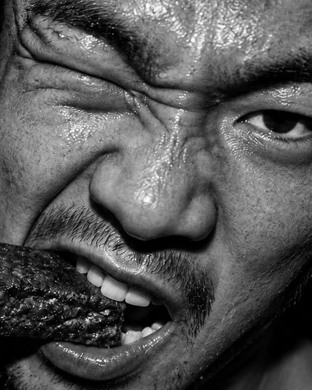 Warrior athlete mid-rep: Outwork. Outlast.