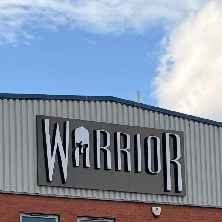 The Warrior sign on the front of our Manchester building