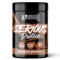 Warrior Serious Protein powder tub, Chocolate Milkshake flavour, 500g – black tub with brown label showing 24g Protein, No Added Sugar and Low Fat badges, with a chocolate milkshake splash graphic.
