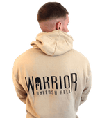 Warrior Hoodie in Desert Sand, worn on model, back view showing Warrior logo and Unleash Hell text